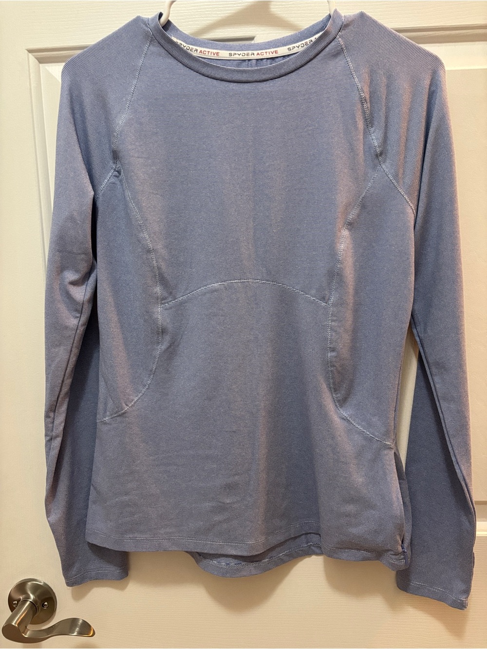 Spyder woman’s Long-Sleeve Performance Top - Light Blue